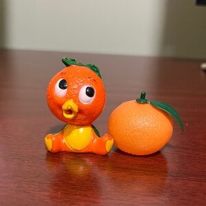 Disney orange bird figurine